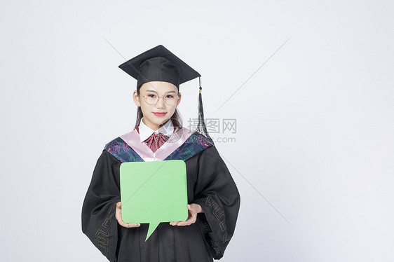 拿着文字框的毕业女学生图片