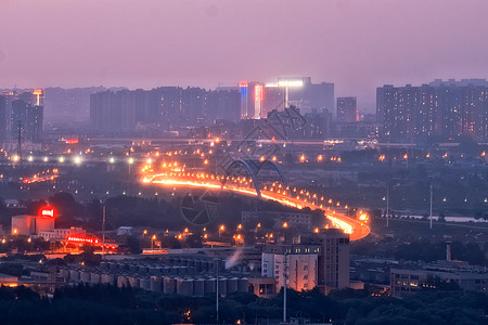 城市夜晚道路夜色中的武汉长丰桥背景