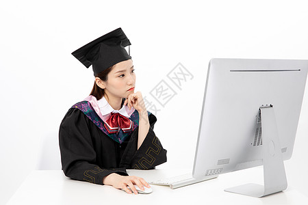 电脑前犹豫的毕业生背景图片