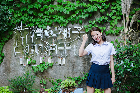 握拳加油写真可爱的女生背景