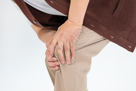 腿部疼痛的老年人背景图片