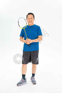 羽毛球运动员打羽毛球的老年人背景