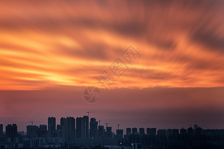 室内风景城市上空的火烧云背景