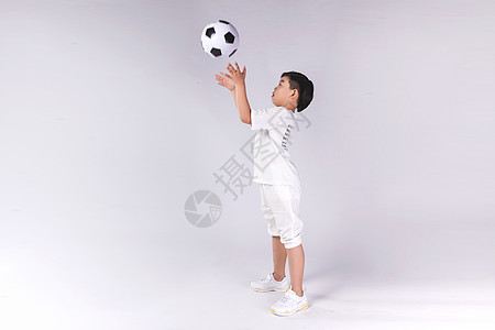 卡通踢足球少年男孩子踢足球背景