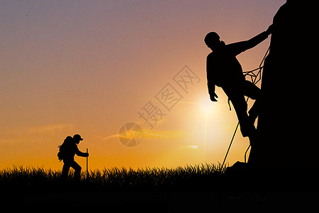 夕阳下登山人物剪影 背景图片