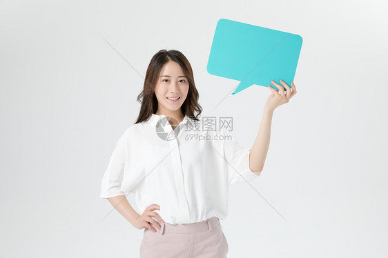 商务女性手持对话框图片