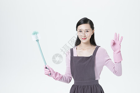 居家女性清洁打扫形象背景图片