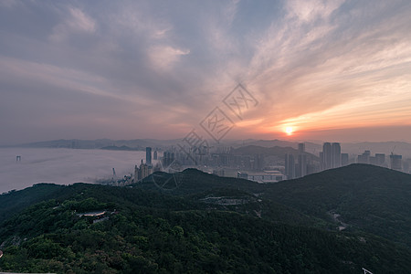 繁华夜景大连平流雾日落背景