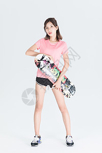 滑板女性背景图片