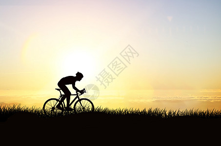夕阳骑车人剪影背景图片