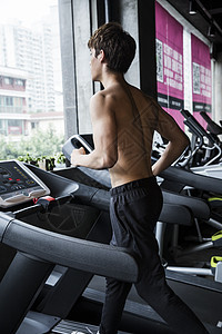 健身男士跑步背景图片