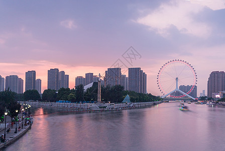 天津市夜景不同天气下的天津之眼背景