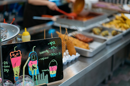 韩国小吃韩国首尔传统市场小吃背景