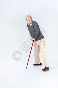 老年人拄拐杖高清图片