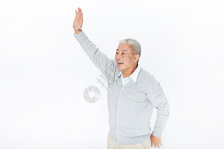 打招呼的老年人图片