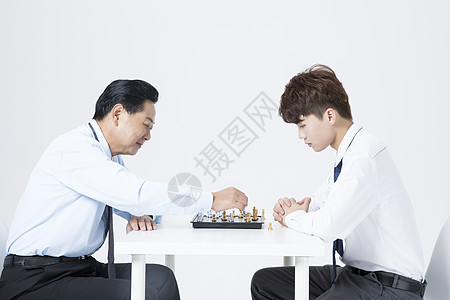 商务人士下棋背景图片