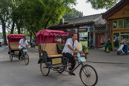 北京的早晨什刹海胡同游三轮自行车背景