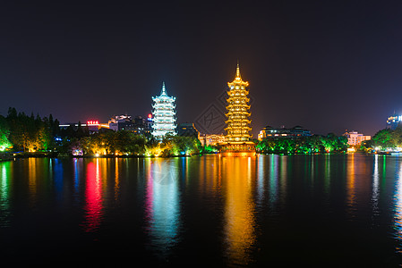 桂林两江四湖桂林日月双塔夜景背景