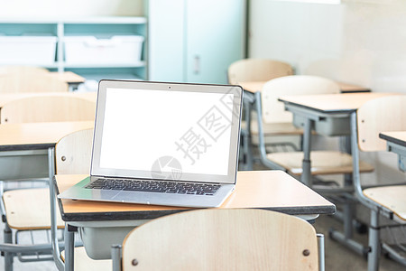 教育互联网课桌上的笔记本电脑背景