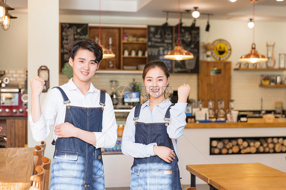 咖啡馆男女服务员加油动作图片