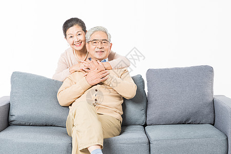 老人夫妻沙发上幸福的老年夫妻背景