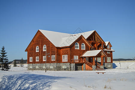 冬季夜晚雪景北极村俄式建筑背景