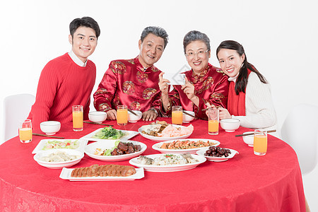 一家人吃饭拍照背景图片