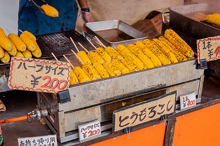 日式烤玉米日本美食烤玉米背景