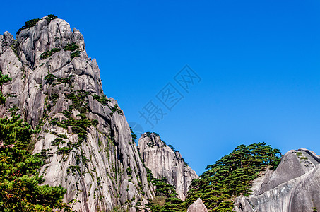 蓝天光晕黄山秋景背景