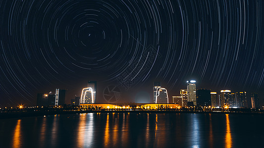 苏州北站中国苏州高铁北站的星空星轨背景