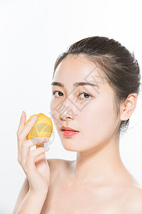 美妆女性与柠檬背景图片