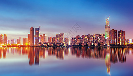 河岸夜景城市倒影设计图片