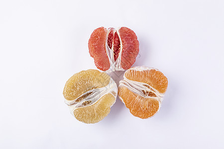 新鲜红心蜜柚背景图片