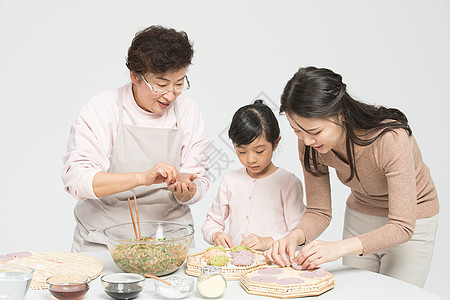 妈妈饺子过年一家人包饺子背景