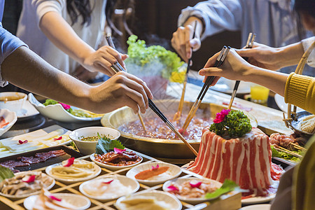 夹菜吃饭火锅青年聚会背景