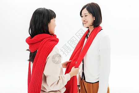 春节母女戴围巾背景图片