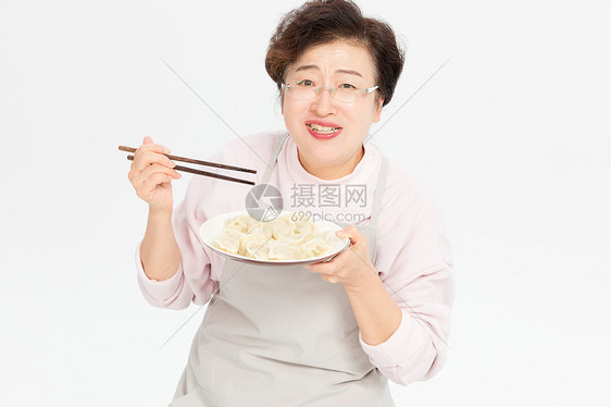 吃饺子的老人图片