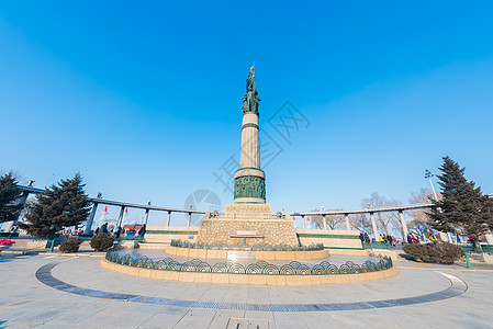 司各特纪念塔冬季的哈尔滨中央大街背景