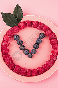 新鲜水果蓝莓树莓背景图片