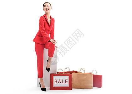 红西装女性购物促销图片