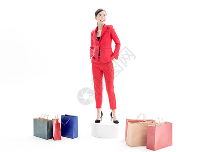 红色西装女性购物图片