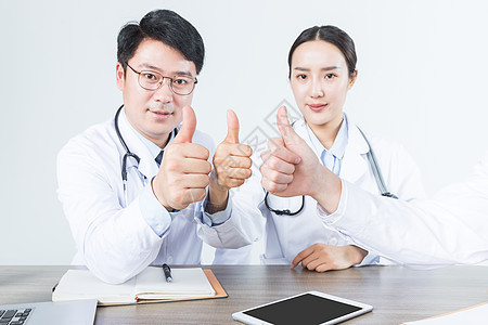 医疗会议医生们举大拇指图片