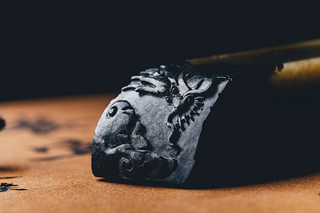 黑玉石雕刻印章背景图片