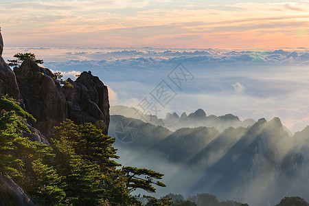 云雾缭绕悬崖黄山云海日出背景