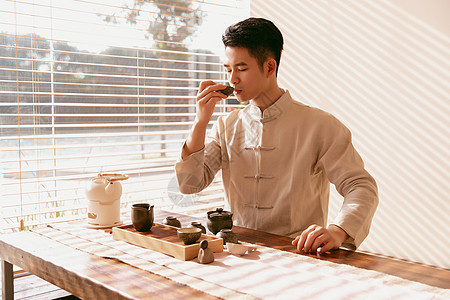 古风帅哥男茶艺师喝茶背景