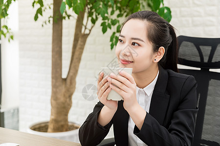 职场女性喝咖啡图片