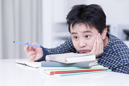 青少年苦恼学习背景图片