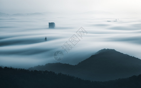 大连海市蜃楼城市风格的平流雾图片