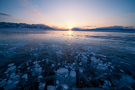 费瓦湖落日新疆冰炮湖背景