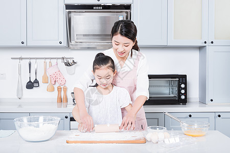 妈妈和女儿烘焙背景图片